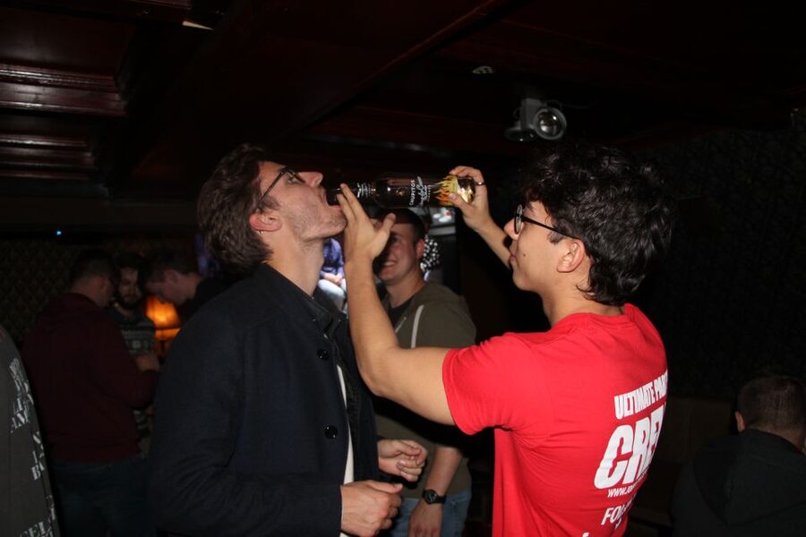 Amsterdam: Red-Light District Pub Crawl and Booze Boat Tour - Four pubs, drink specials, and simple games