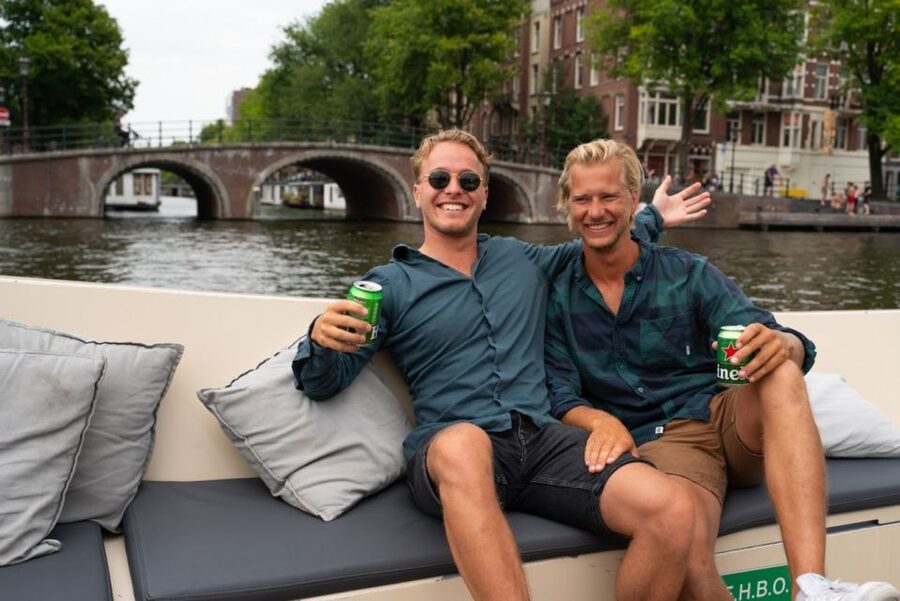 Amsterdam: Red-Light District Pub Crawl and Booze Boat Tour - The canal cruise is the gentler half