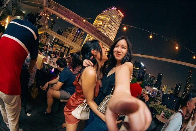 Bangkok After Dark: Pub Crawl Adventure - Juicy brings music, dancing, and friendly competition