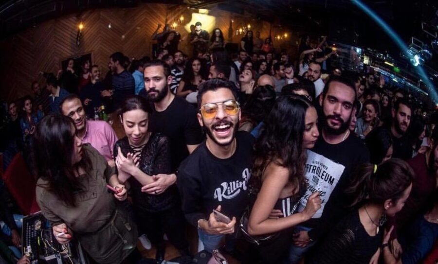 Cairo: Pub Crawl and Speakeasy Bar Tour with 2 Free Drinks - Cairo after dark, with a local guide in front