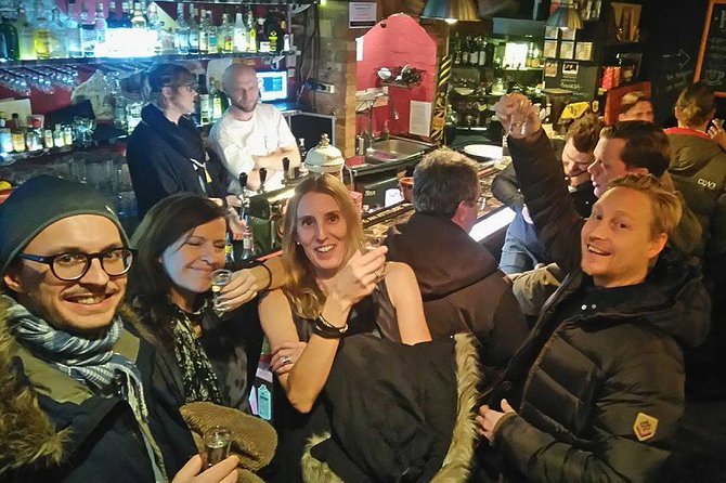 Evening Warsaw - pub and history tour with hotel pickup - The Palm Tree stop explains Warsaw after communism