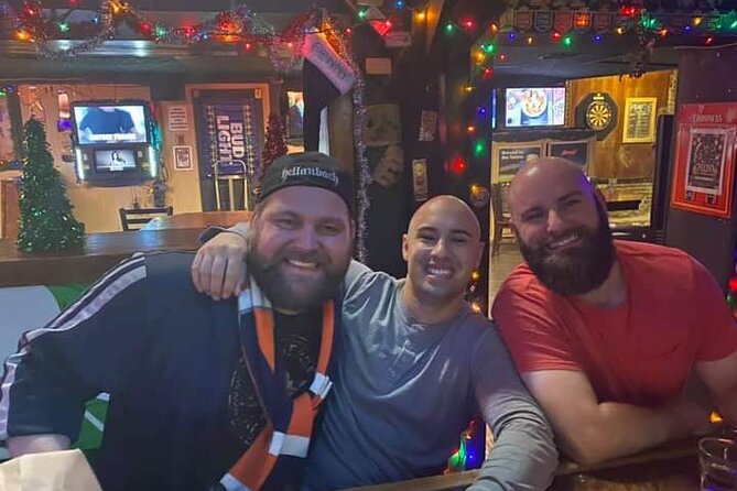 Galveston's Best Pub Crawl Tour and Guided History Walk - Galveston after dark, with a drink in hand
