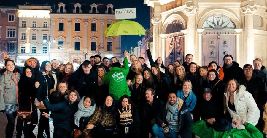 Krakow: Pub, Bar & Club Crawl - Meeting the green-jacketed host in Krakow’s Old Town