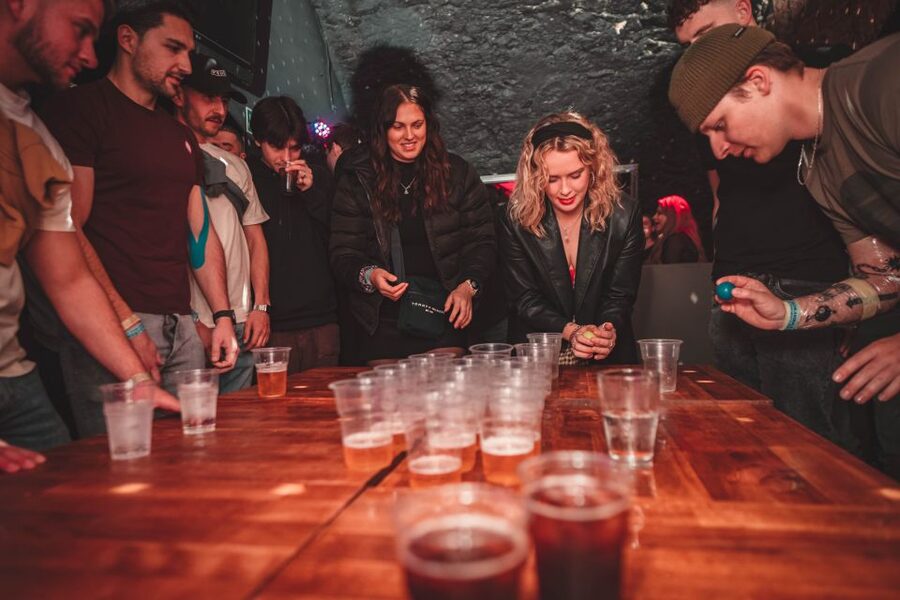 Krakow: Pub Crawl with 1 Hour of Unlimited Alcoholic Drinks - Photographer, games, and the social side