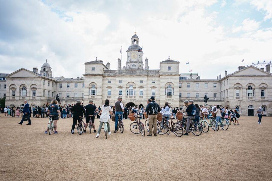 London: Landmarks & Secrets Bike Tour with Pub & Street Art - Crossing the Thames toward Big Ben and Westminster
