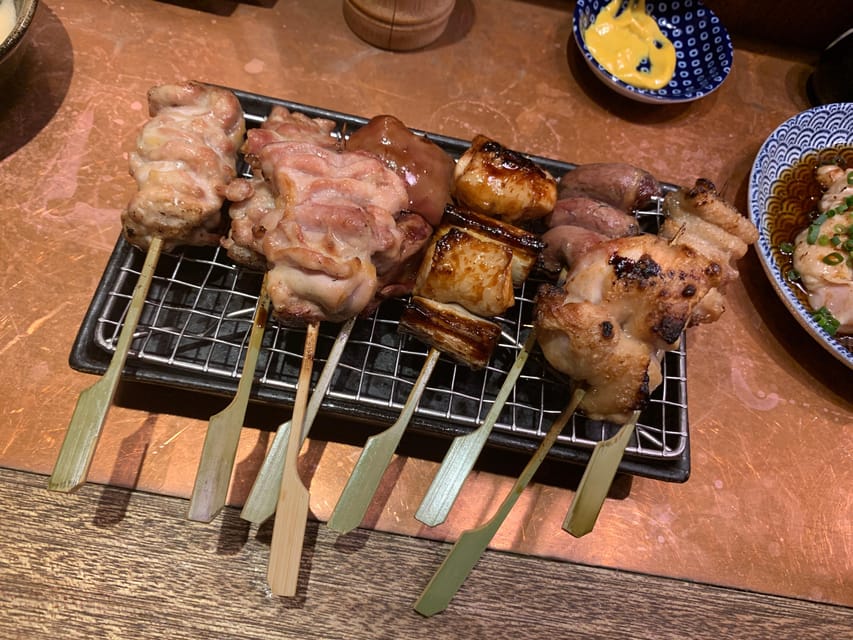 Osaka: Deep Food Tour and Bar Hopping in Namba - Hozenji Temple, a quiet turn in the route