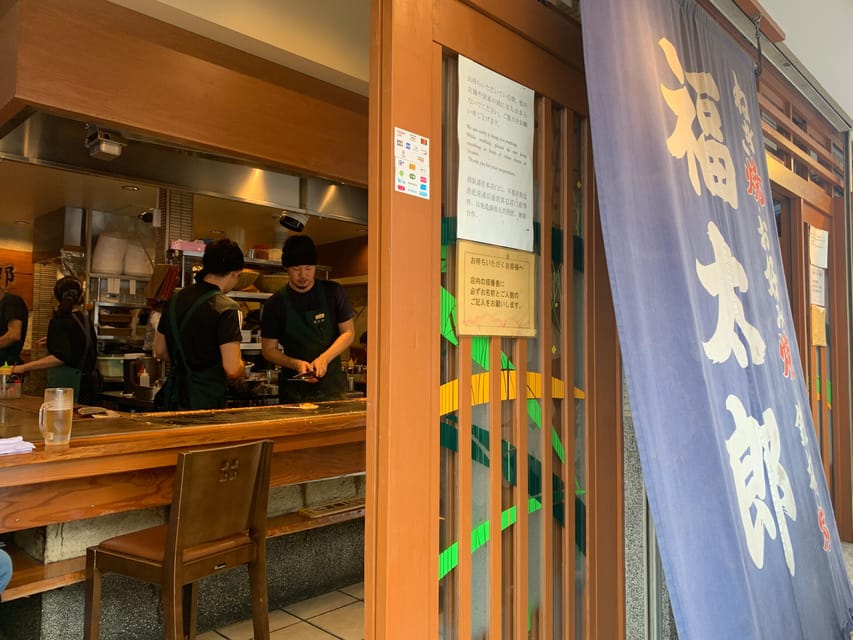 Osaka: Deep Food Tour and Bar Hopping in Namba - A restaurant stop for Osaka specialties