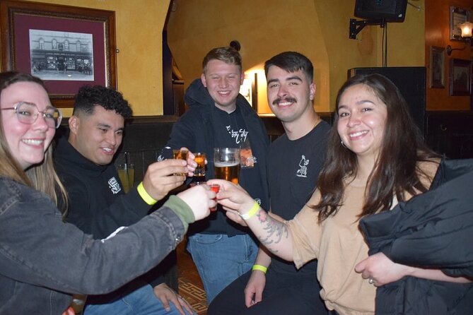 Paris: City Center Guided Pub Crawl with Shots & Club Entry - The walk to Porte-Saint-Denis and the final club
