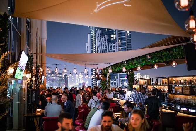 Pub Crawl Dubai: Nightlife Tours - 8 pm at the first rooftop bar