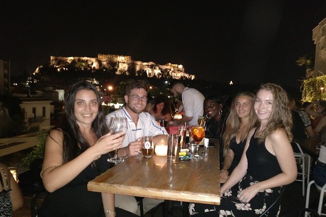 Rooftop Bar Hopping with Local Friends - The third rooftop, a final toast above Athens