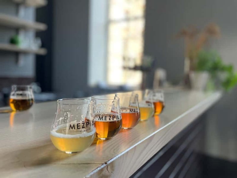 Vilnius: Pub Crawl with Welcome Drink and Traditional Snacks - Sampling Lithuanian spirits at two bars