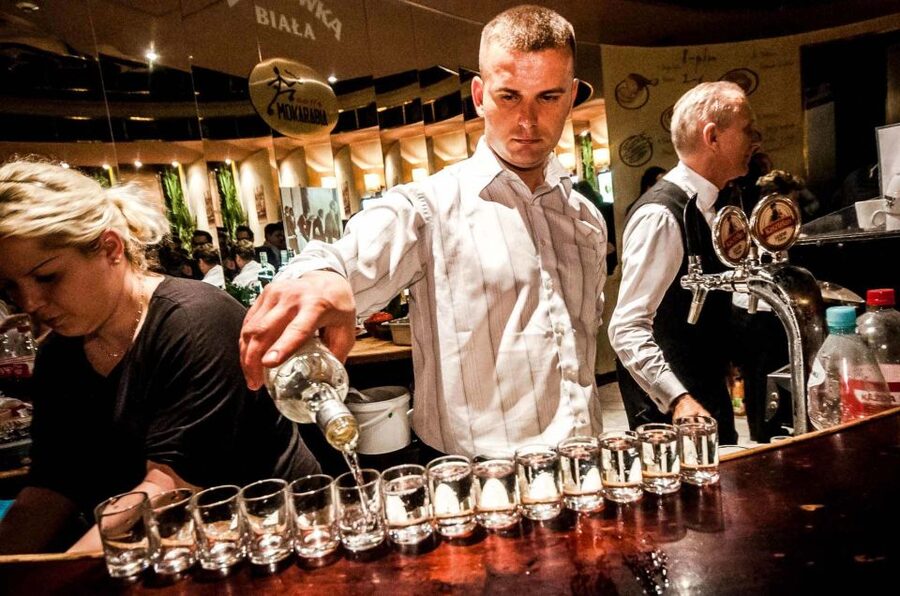 Warsaw: Evening History and Pubs Tour by Retro Minibus - A local bar and the second vodka stop