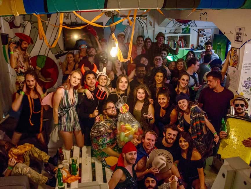Zagreb: Pub Crawl, 1-Hour of Unlimited Drinks, & Club Entry - Drinking games before the first bar